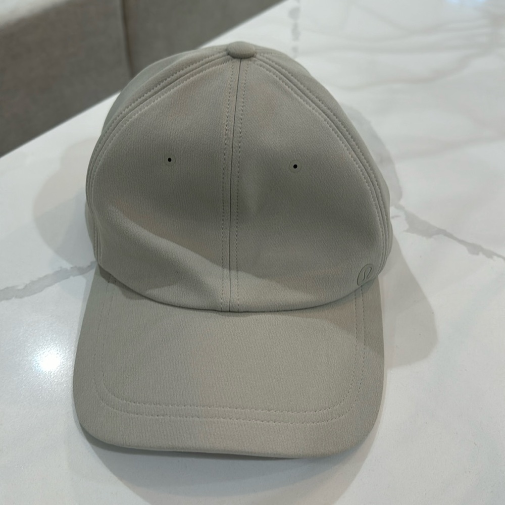 Beige never-worn Lululemon hat